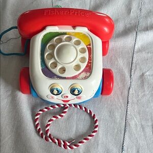 Fisher-Price Colorful Chatter Telephone Toy - Red, White, and Blue . Vintage